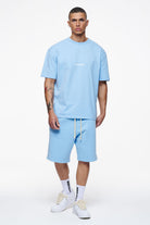 Pegador Colne Logo Oversized Tee Vintage Washed Riviera Blue Ganzkörper Bild aus der Finer Things Kollektion für Herren