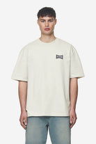 Pegador Dacko Oversized Tee Washed Salty Cream Black Seitenansicht aus der Next Wave Kollektion für Herren