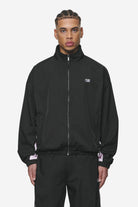 Pegador Stow Boxy Track Jacket Black Bubblegum Hauptansicht aus der Next Wave Kollektion für Herren