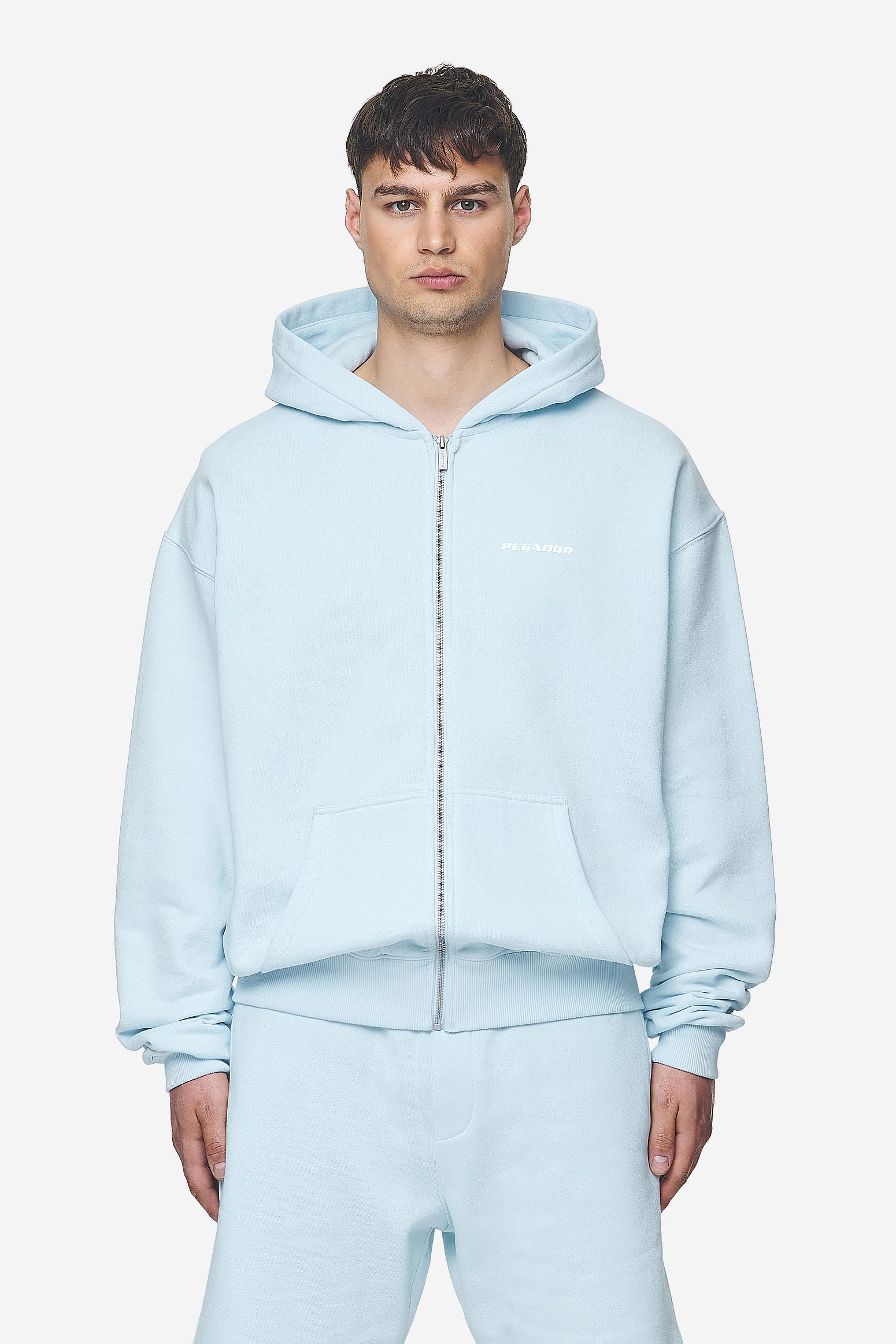 Pegador Logo Oversized Sweat Jacket Washed Baby Blue White Gum Hauptansicht aus der Next Wave Kollektion für Herren