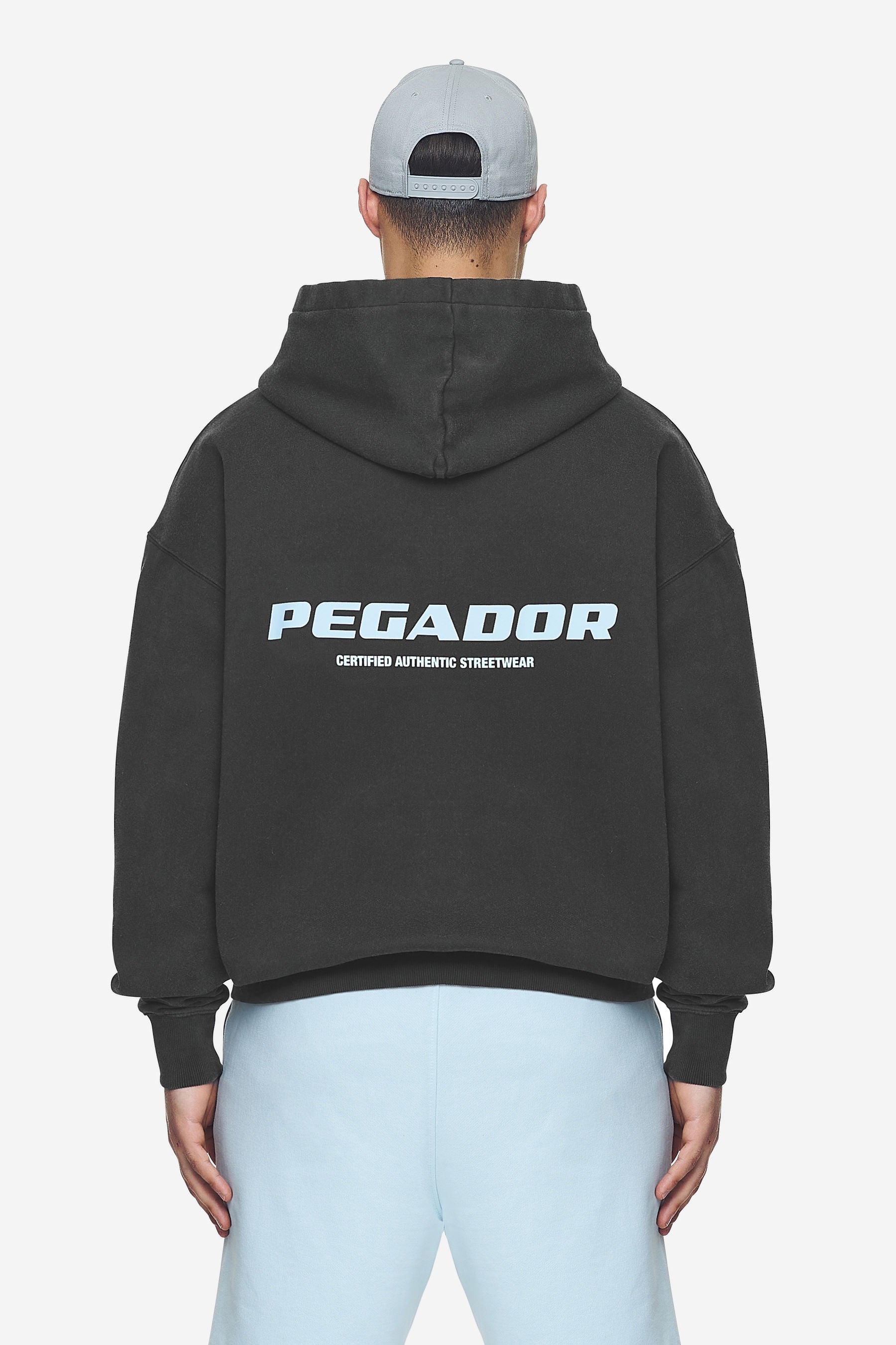 Pegador Colne Logo Oversized Hoodie Vintage Black Baby Blue Hauptansicht aus der Next Wave Kollektion für Herren