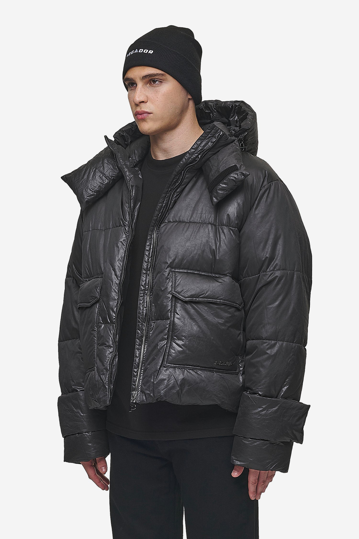 Black oversized puffer jacket with hood on sale